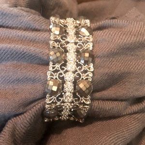 Silver, Black and Grey Bracelet 1.25” wide. Stretch fits 7-7.5” wrist